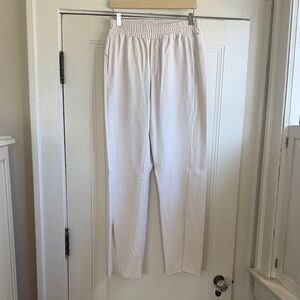 Lululemon bone pull on pants with side slits and pockets.